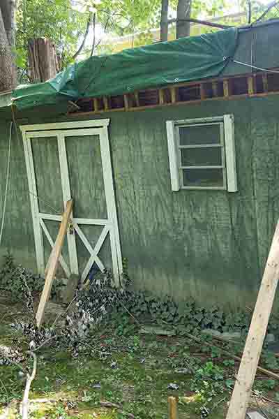 shed wall propped up