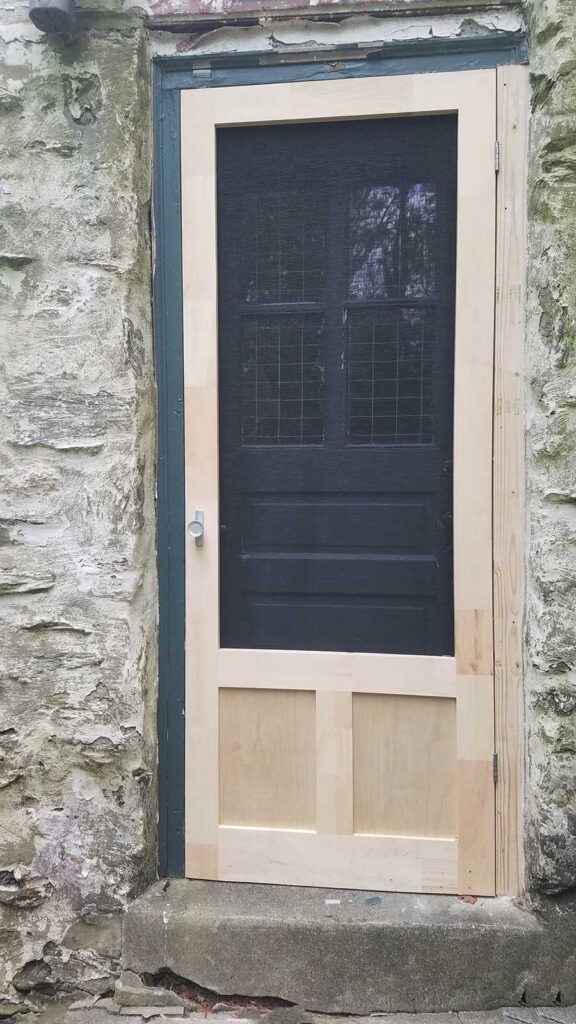 install wood screen door